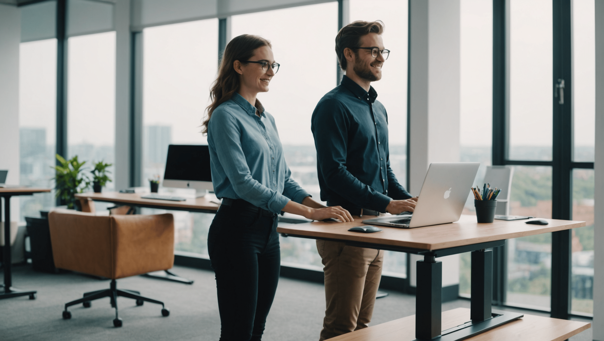 Young professional enjoys modern office with standing desk.